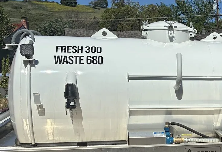 The freshwater and waste tanks on a Pro Portable Restrooms service truck